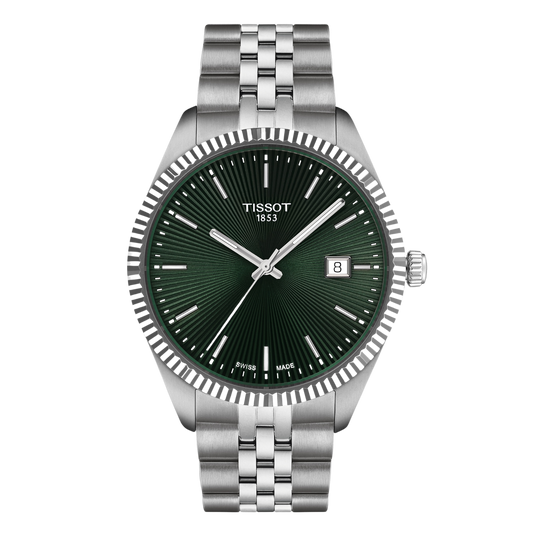 Tissot Green Dial Watch with a striking sunray-textured dial, fluted bezel detailing, and a stainless steel bracelet that blends classic elegance with contemporary styling