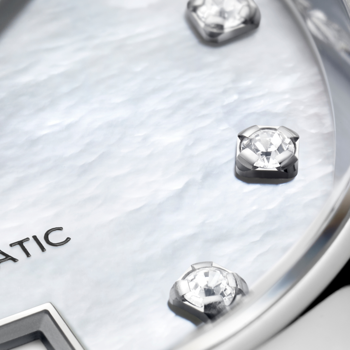 TAG Heuer Carrera Date diamond watch featuring a 29mm polished steel case, mother-of-pearl dial and steel bracelet