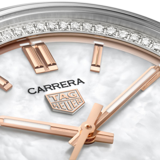 close-up of the mother-of-pearl dial highlighting its natural shimmer, rose gold-tone indices, handset and date window at 6 o’clock