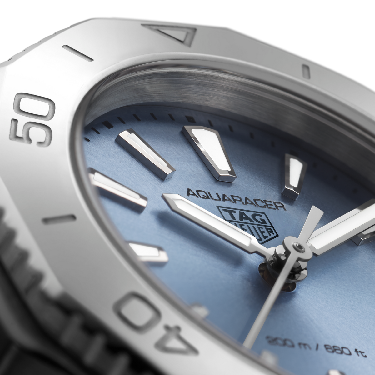 full view of TAG Heuer Aquaracer showcasing the brushed and polished steel bracelet and sporty case proportions