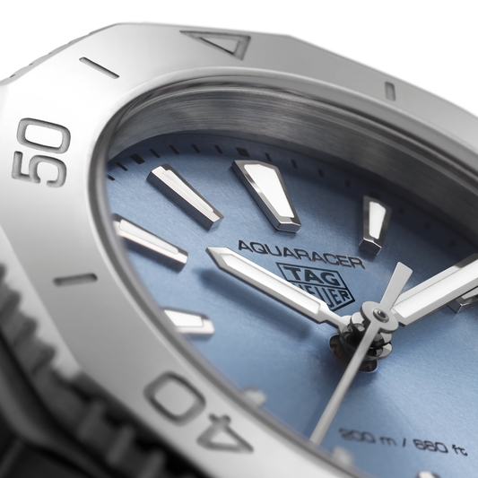 full view of TAG Heuer Aquaracer showcasing the brushed and polished steel bracelet and sporty case proportions