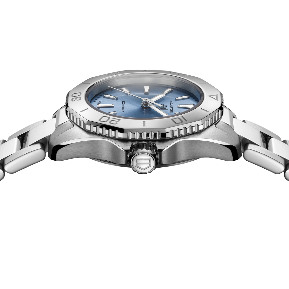 close-up of the blue dial highlighting the sunray finish, luminous hour markers and clean layout