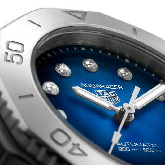 full view of TAG Heuer Aquaracer showcasing the brushed and polished steel bracelet and robust case design