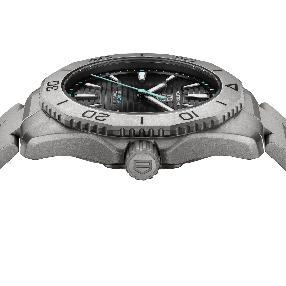 detailed view of the matte grey unidirectional bezel with engraved numerals and dive scale markings for precise underwater timing