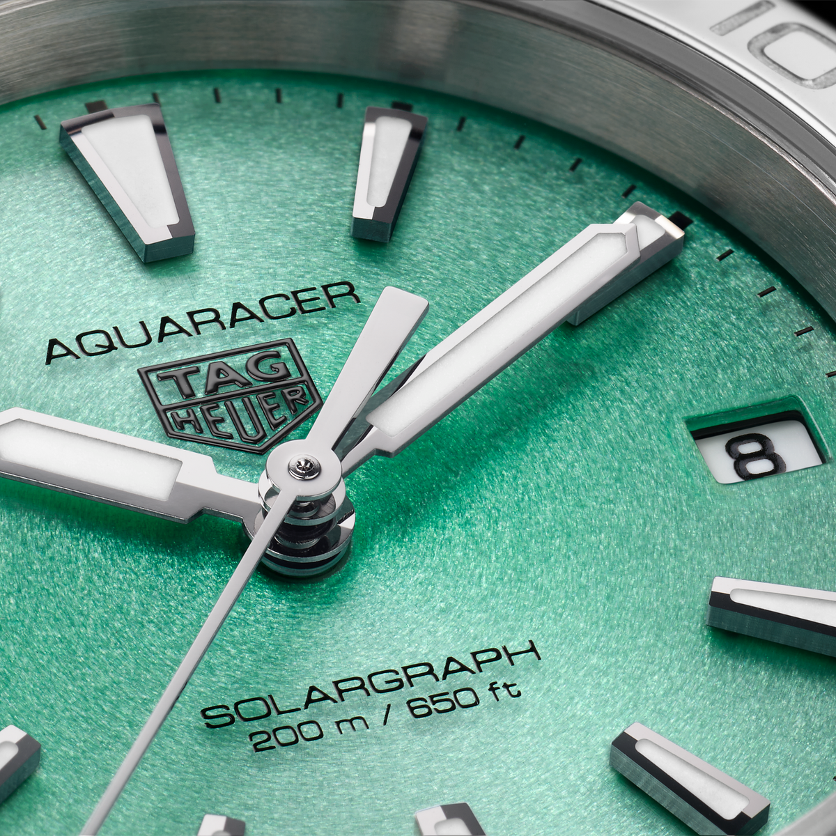 full view of the TAG Heuer Aquaracer Solargraph highlighting the brushed steel bracelet and angular, sporty case design
