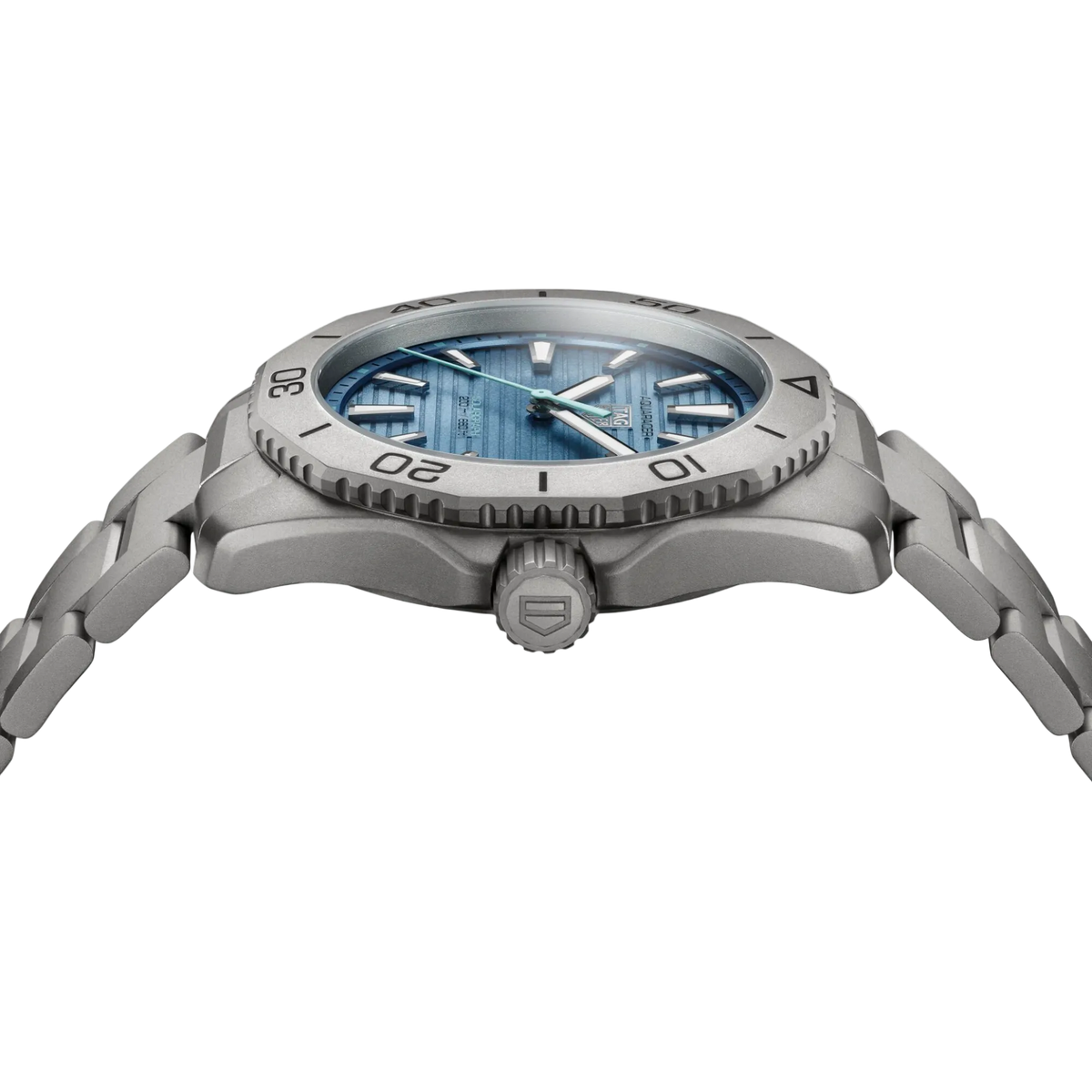 side angle of the case revealing the screw-down crown, angular Aquaracer bezel, and sporty profile engineered for active wear