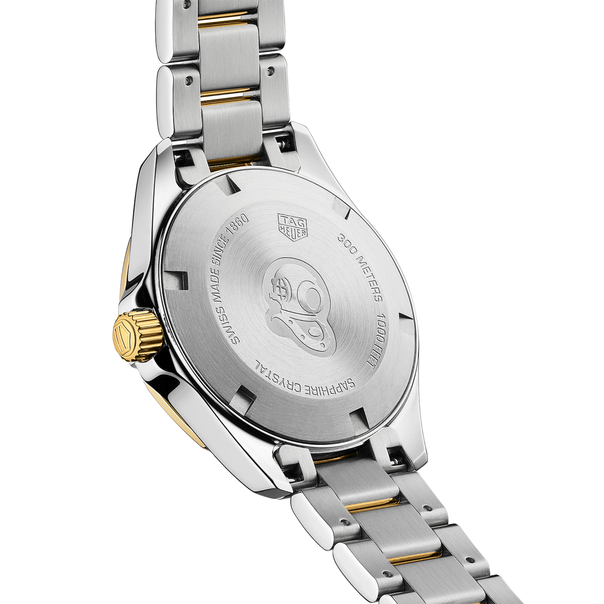 detailed view of the yellow gold unidirectional bezel with engraved numerals designed for precision timing and durability