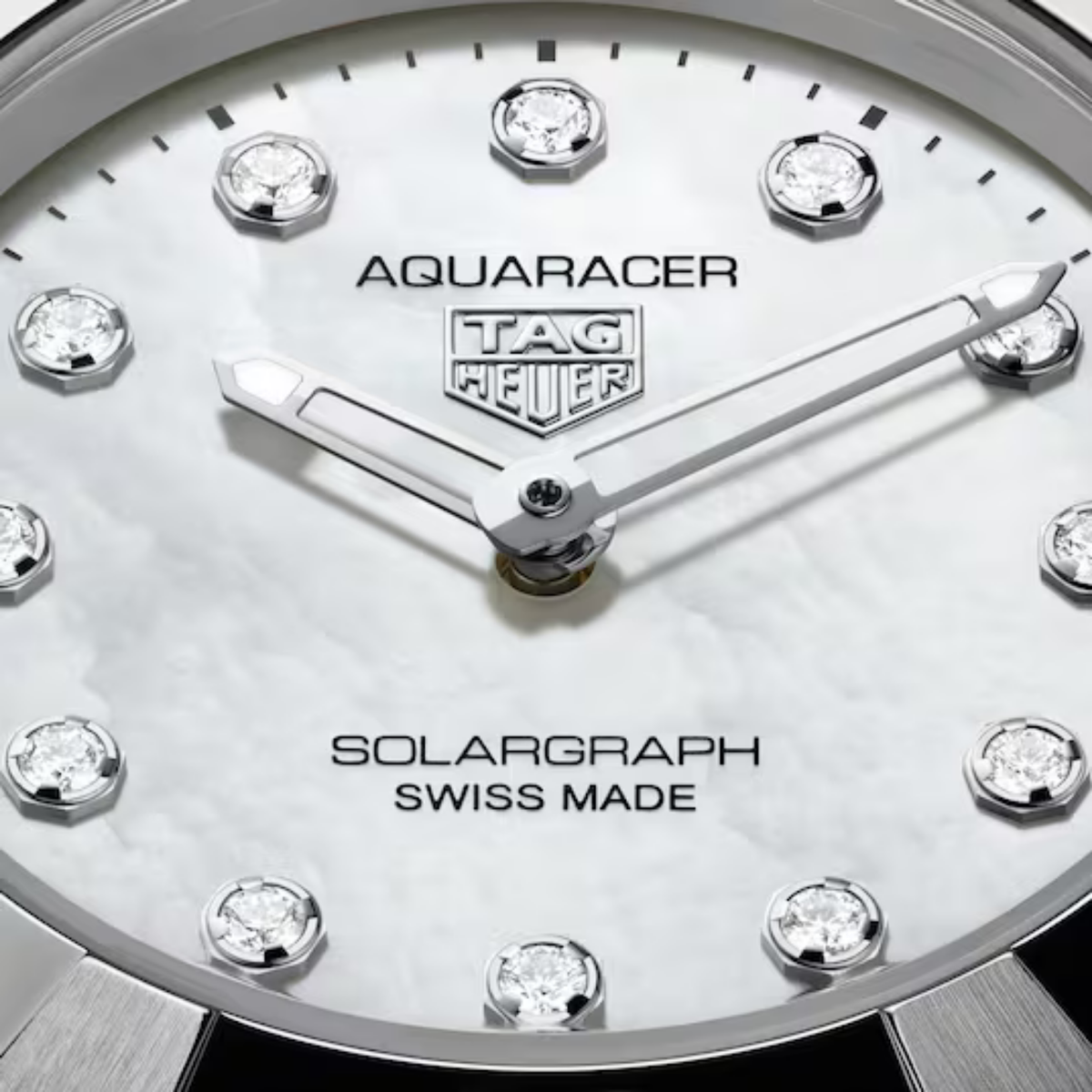 TAG Heuer Aquaracer Professional 100 Solargraph 28mm, featuring a steel case, mother-of-pearl diamond dial and TH51-00 solar movement.