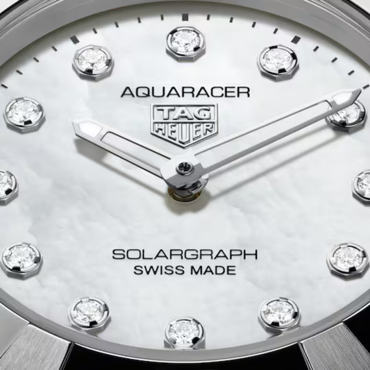 TAG Heuer Aquaracer Professional 100 Solargraph 28mm, featuring a steel case, mother-of-pearl diamond dial and TH51-00 solar movement.