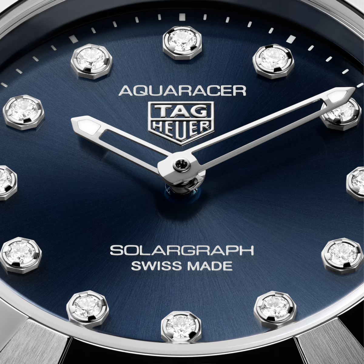 Blue sunray-brushed dial with 12 diamond indexes