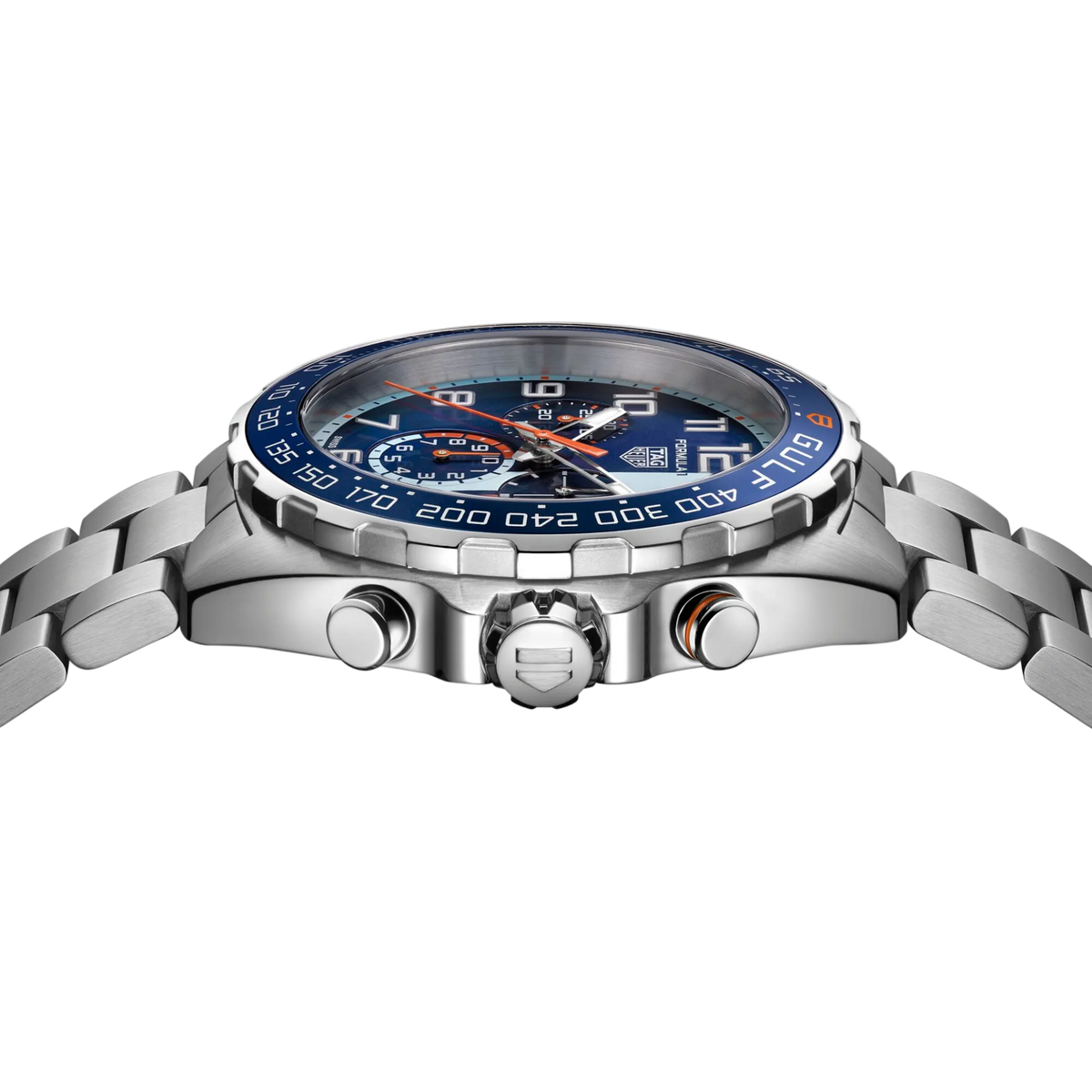 side angle view of the steel case featuring the blue tachymetre bezel, crown and pushers, emphasising the watch’s motorsport-inspired, performance design