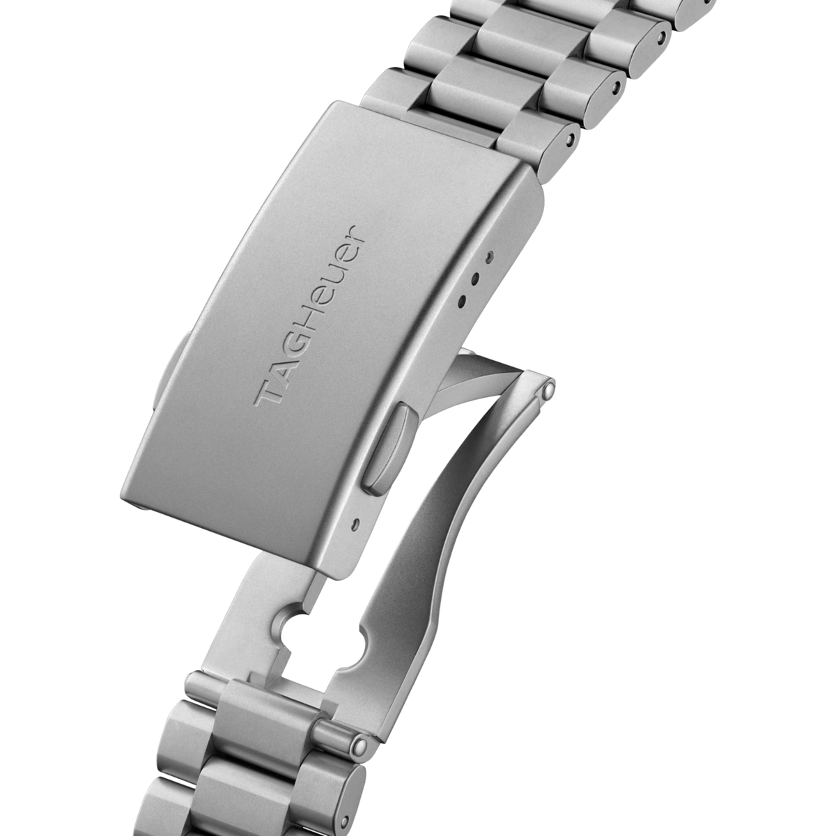 Close-up of the stainless steel bracelet clasp engraved with the TAG Heuer logo.