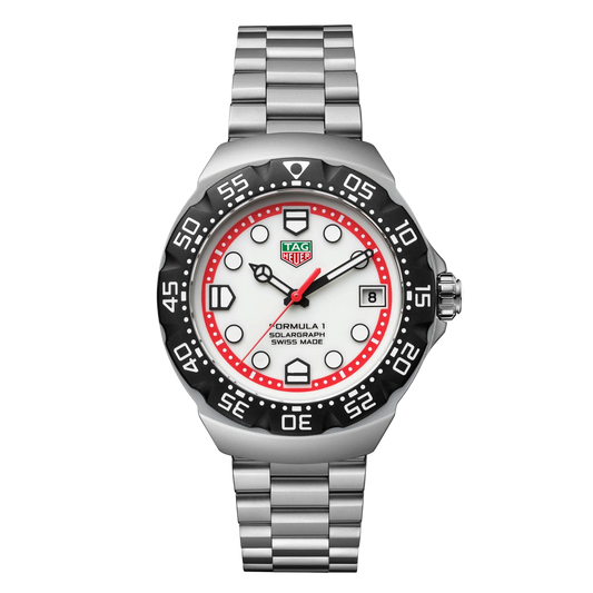 TAG Heuer Formula 1 Solargraph 38mm watch with white dial, black rotating bezel, bold red inner ring, red seconds hand, luminous markers, date window at 3 o’clock, and stainless steel bracelet