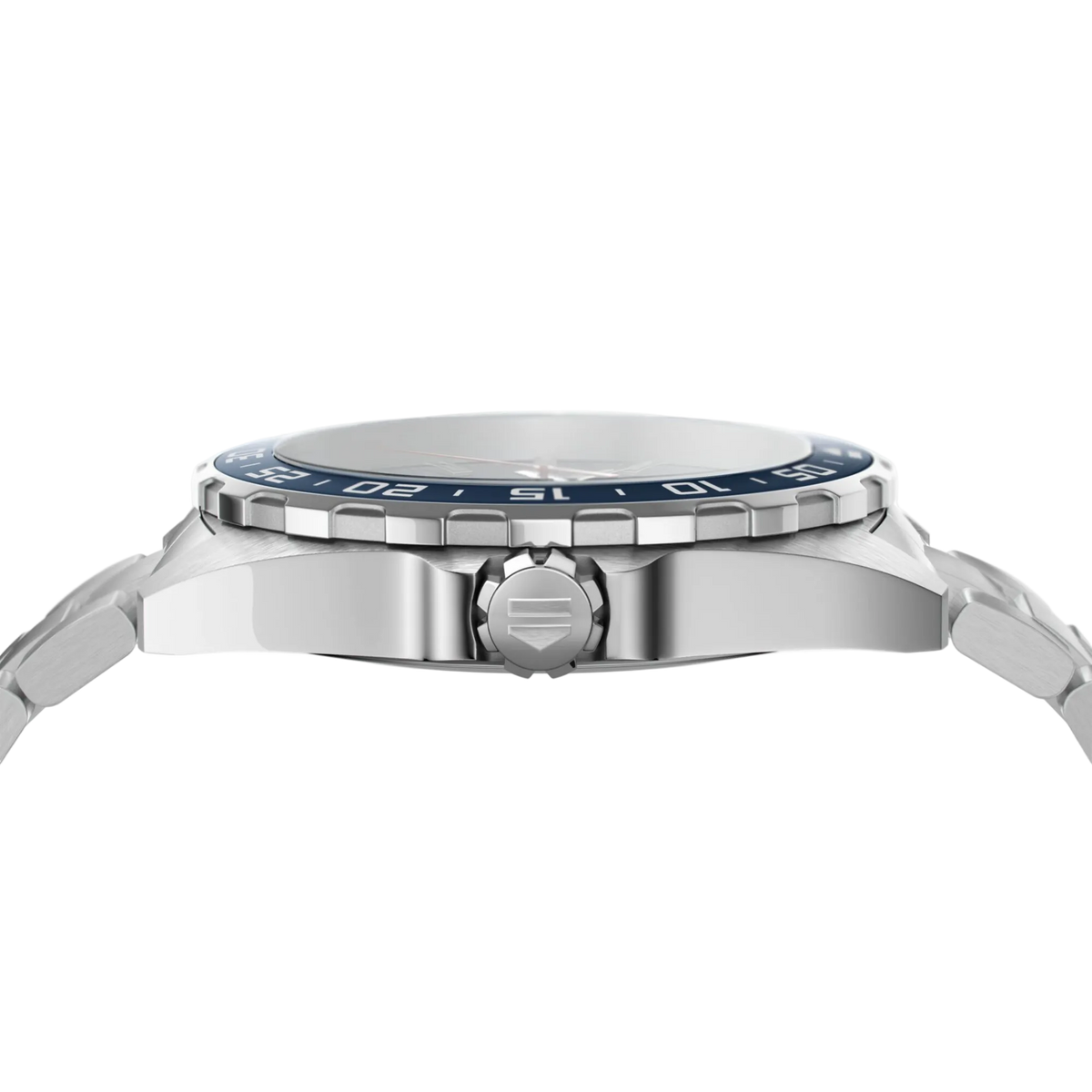 side angle view of the steel case featuring the blue bezel, crown detailing, and robust, sporty construction