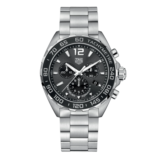 TAG Heuer Formula 1 chronograph watch with dark grey dial, three sub-dials, black tachymetre bezel, date window at 4 o’clock, and stainless steel bracelet