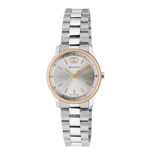 Gucci stainless steel watch with a silver sunray dial, yellow gold-tone bezel, and minimalist baton hour markers shown in full front view