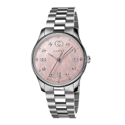 Gucci stainless steel watch with a pink mother-of-pearl dial, diamond hour markers, and fluted bezel shown in full front view
