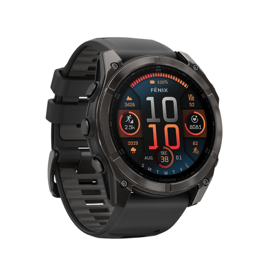 side profile of the Garmin Fenix smartwatch highlighting the rugged outdoor-ready case, textured pushers, and durable black silicone strap designed for training and adventure use
