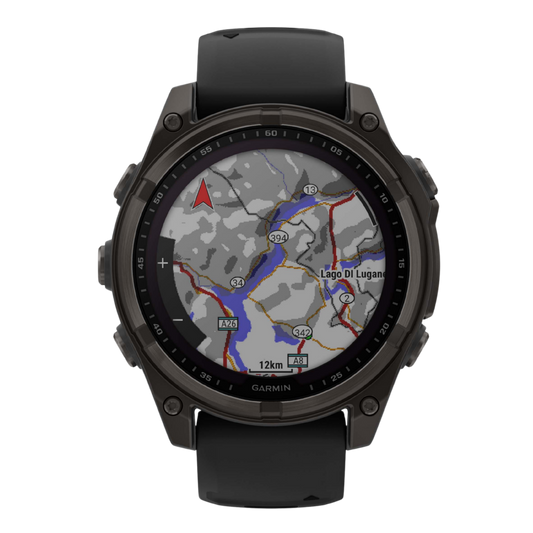 Garmin Fenix multisport GPS smartwatch with black silicone performance strap, dark titanium-style case, and advanced training metrics display shown in angled front view