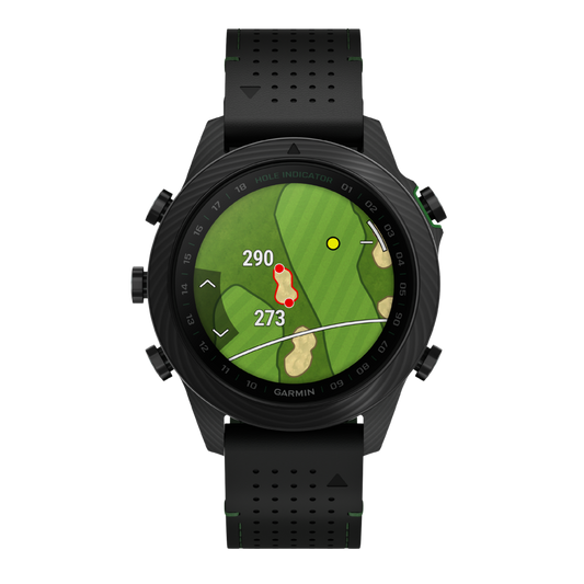 Garmin MARQ Fused Carbon smartwatch with black AMOLED golf display, forged carbon case, black perforated strap with green lining, and golf performance tracking interface shown in angled front view