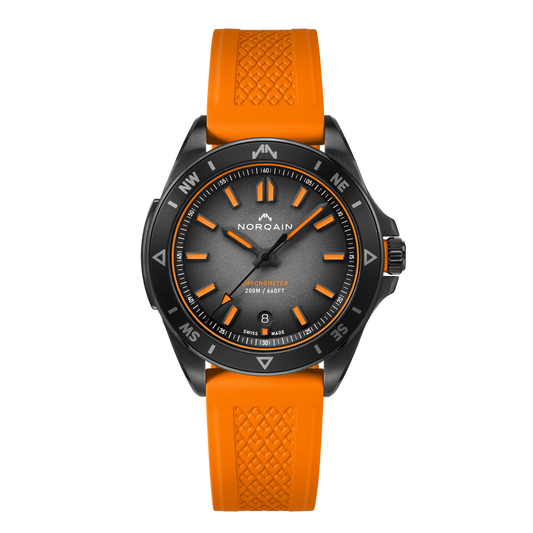 Built for adventure, the NORQAIN Adventure Neverest 40mm pairs a bold black dial with a vibrant orange rubber strap. Limited in production, it combines rugged performance with a fresh, modern look.
