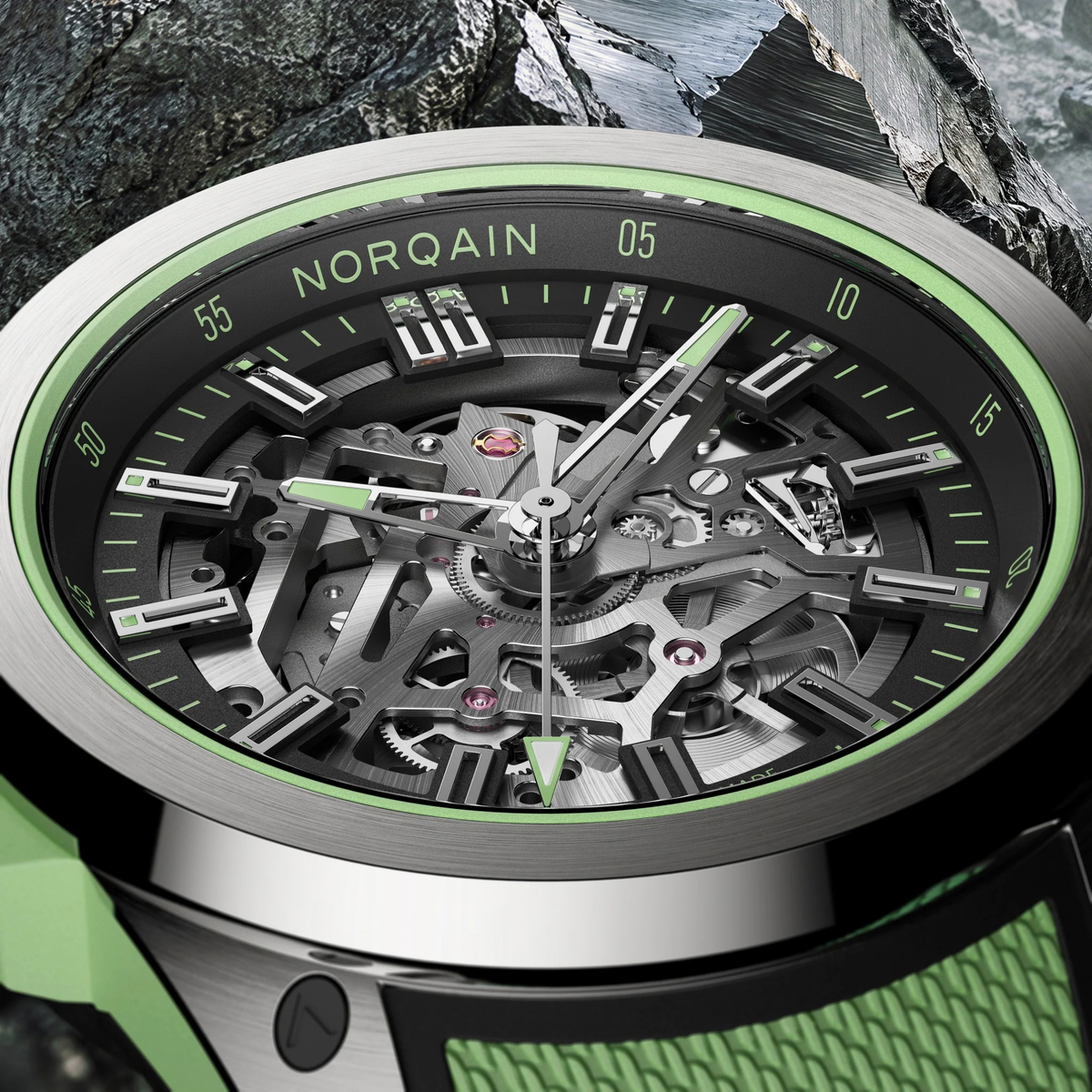 The openworked black dial reveals the intricate mechanical architecture beneath, complemented by mint green detailing and Super-LumiNova® accents for enhanced visibility