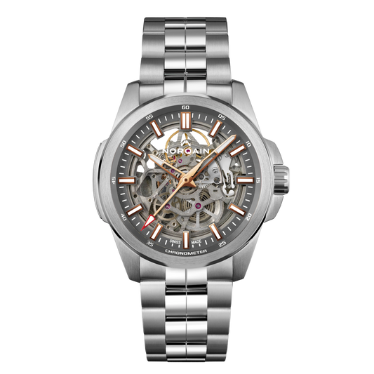 Front view of the Norqain Independence Skeleton Chronometer Watch featuring an open-worked skeleton dial, visible automatic movement, rose gold-tone hands and stainless steel bracelet.