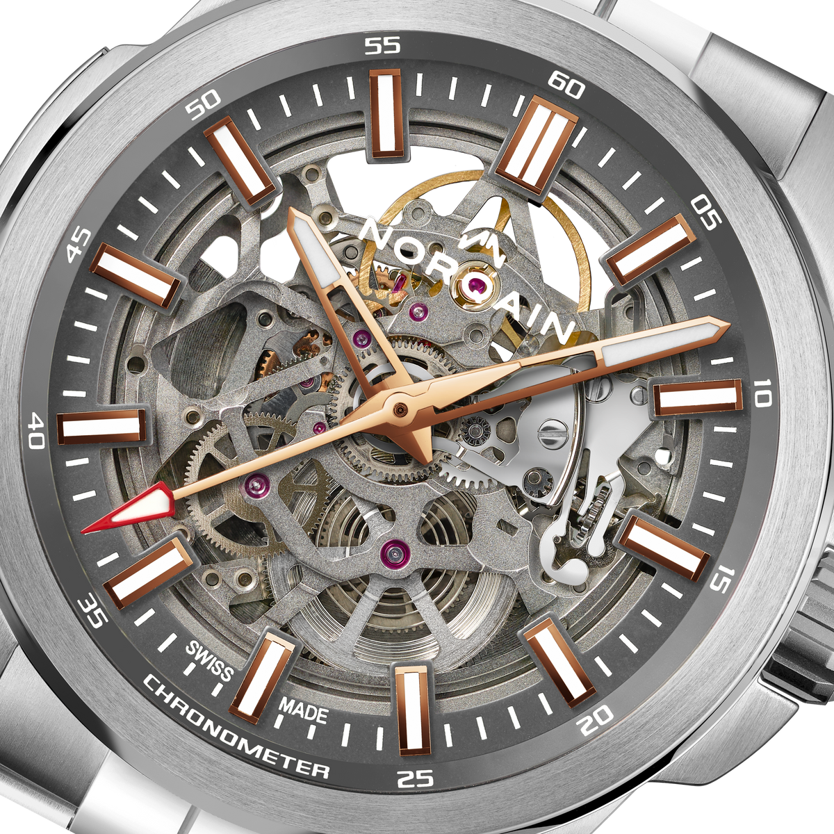 Close-up detail of the Norqain Independence Skeleton Chronometer featuring the intricate open-worked movement, visible gears and jewels, rose gold-tone accents and Swiss-made mechanical craftsmanship.