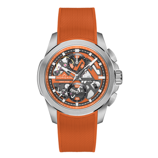 Front view of the Norqain Independence Skeleton Chronograph Watch featuring a vibrant orange open-worked dial, exposed automatic movement and matching orange rubber strap.