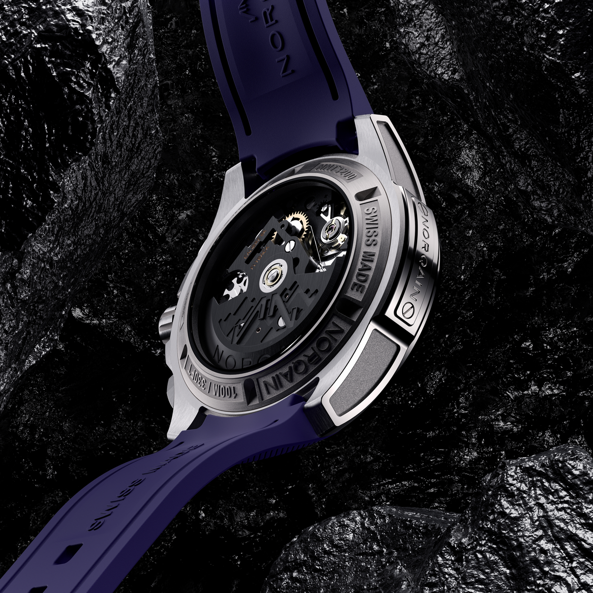 Watch with blue strap and visible brand name on dark textured background