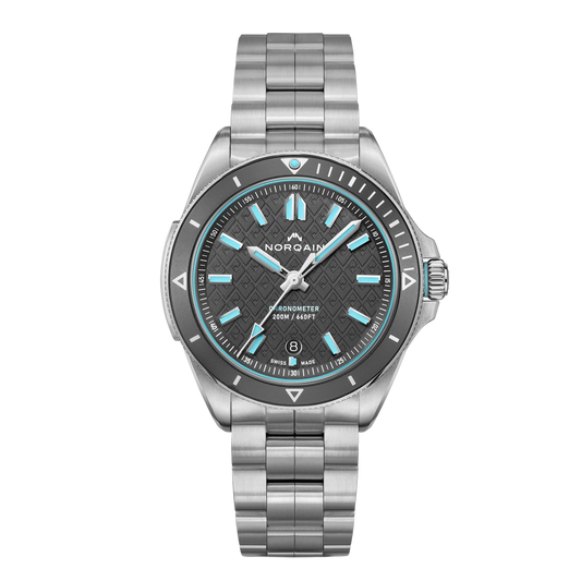 NORQAIN Adventure 40mm automatic watch with grey mountain pattern dial, light blue Super-LumiNova and stainless steel bracelet