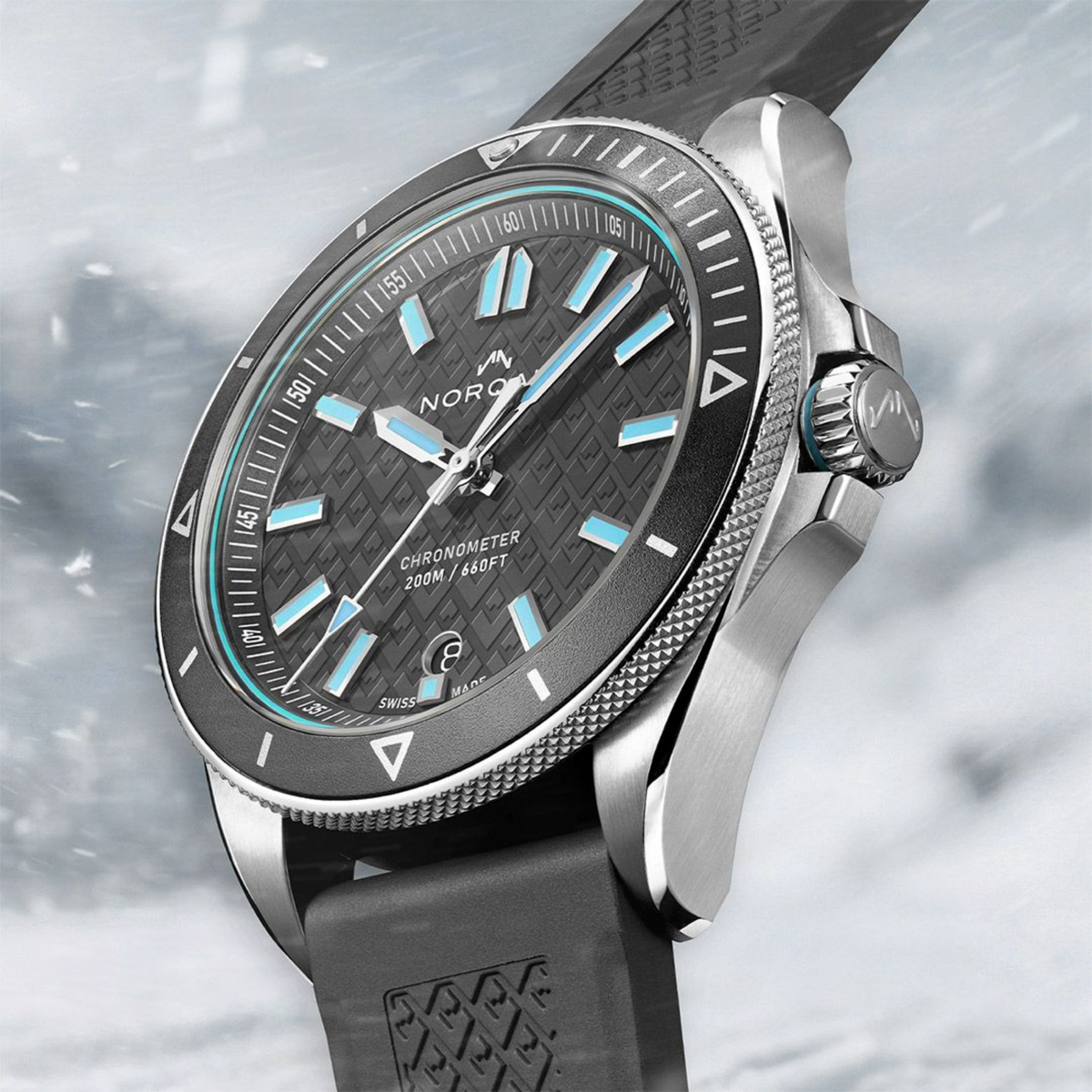 NORQAIN Adventure 40mm steel sports watch with grey patterned dial, rotating grey aluminium bezel and light blue luminous details