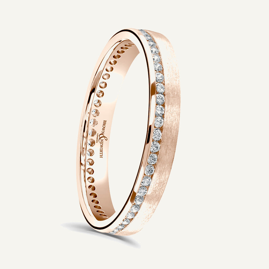 Round Brilliant Cut, Channel, Offset Diamond Eternity Ring