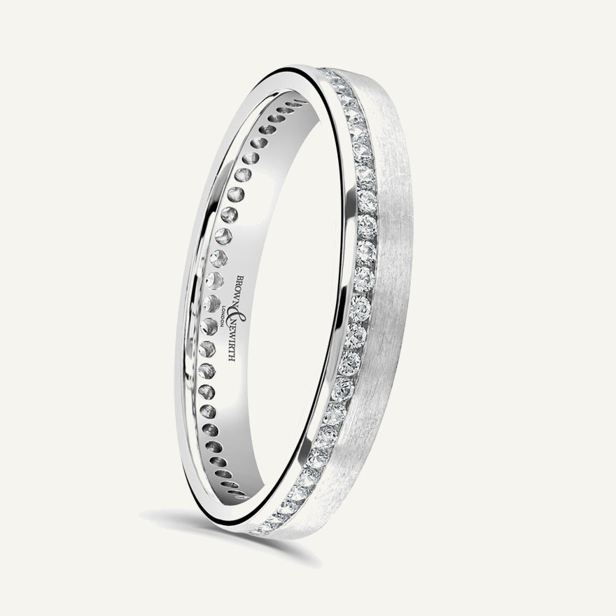 Round Brilliant Cut, Channel, Offset Diamond Eternity Ring