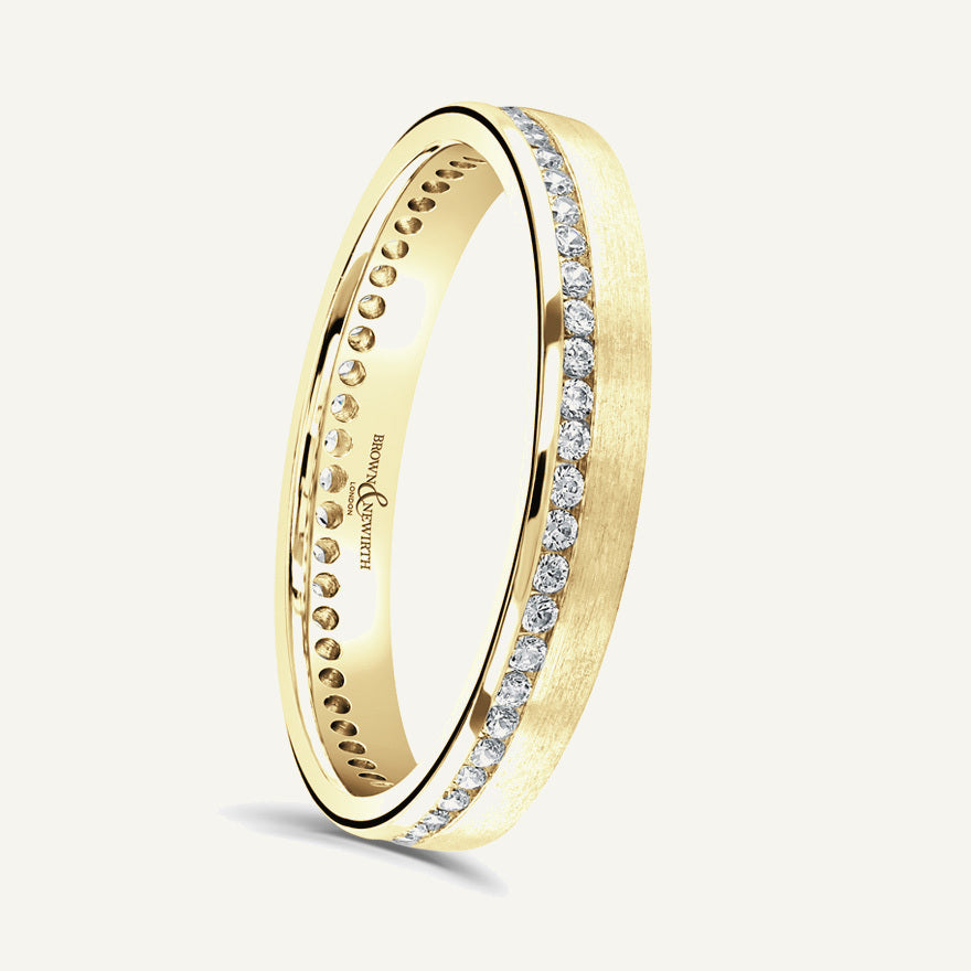 Round Brilliant Cut, Channel, Offset Diamond Eternity Ring