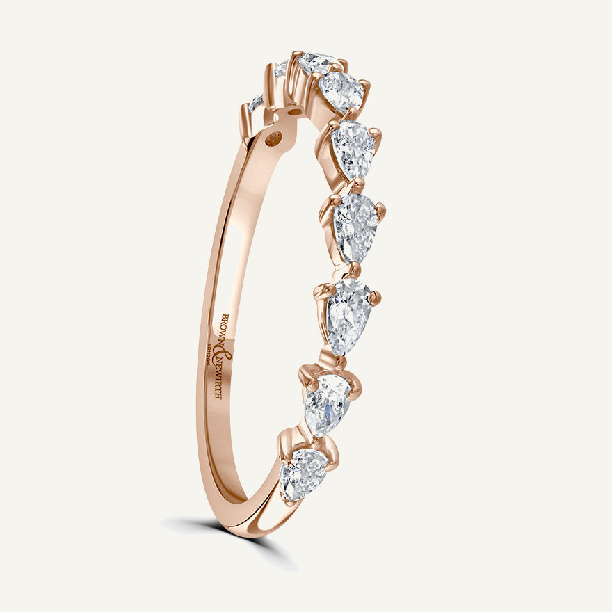 Pinched Design With Claw Set Pear Cuts Diamond Eternity Ring
