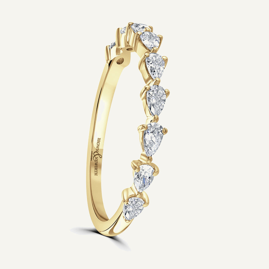 Pinched Design With Claw Set Pear Cuts Diamond Eternity Ring