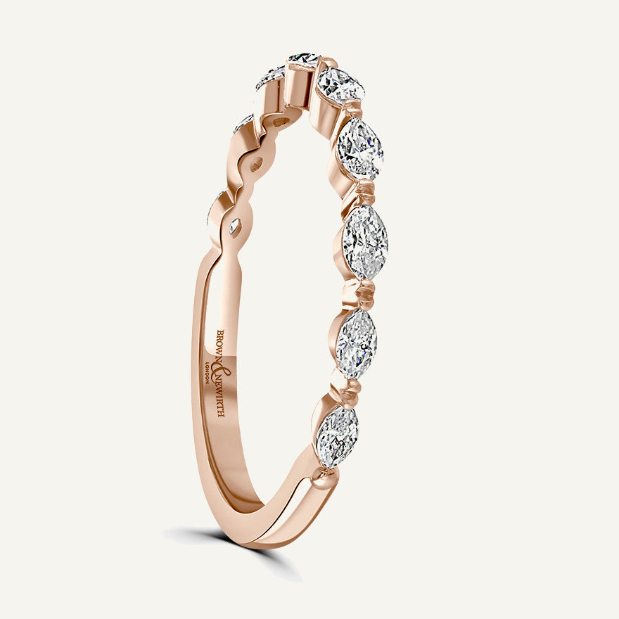 Pinched Design With Claw Set Marquise Cuts Diamond Eternity Ring