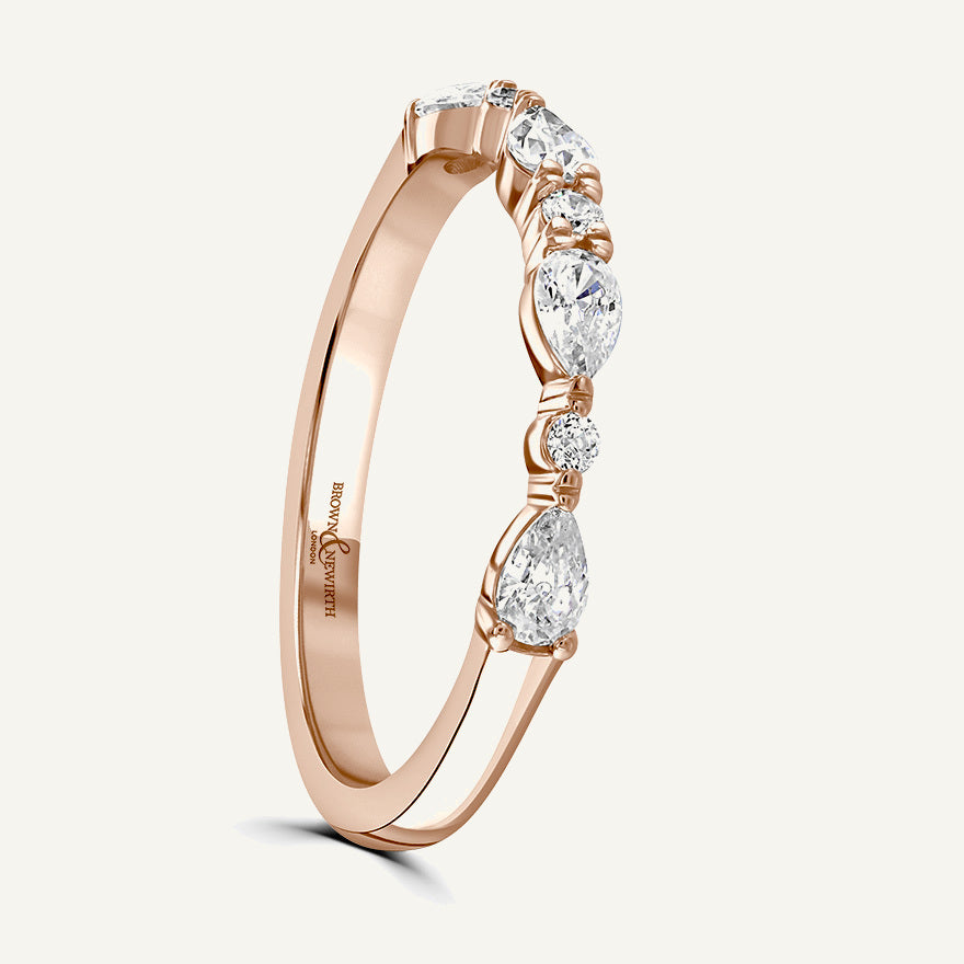 Pinched Design With Claw Set Round & Pear Cuts Diamond Eternity Ring