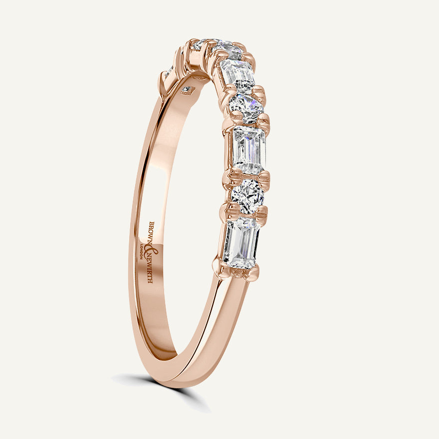 Claw Set With Emerald And Round Cuts Diamond Eternity Ring