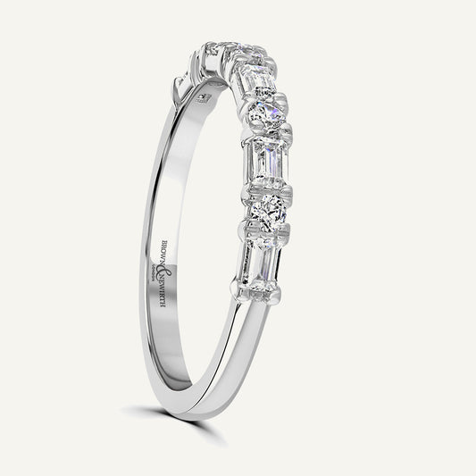 Claw Set With Emerald And Round Cuts Diamond Eternity Ring