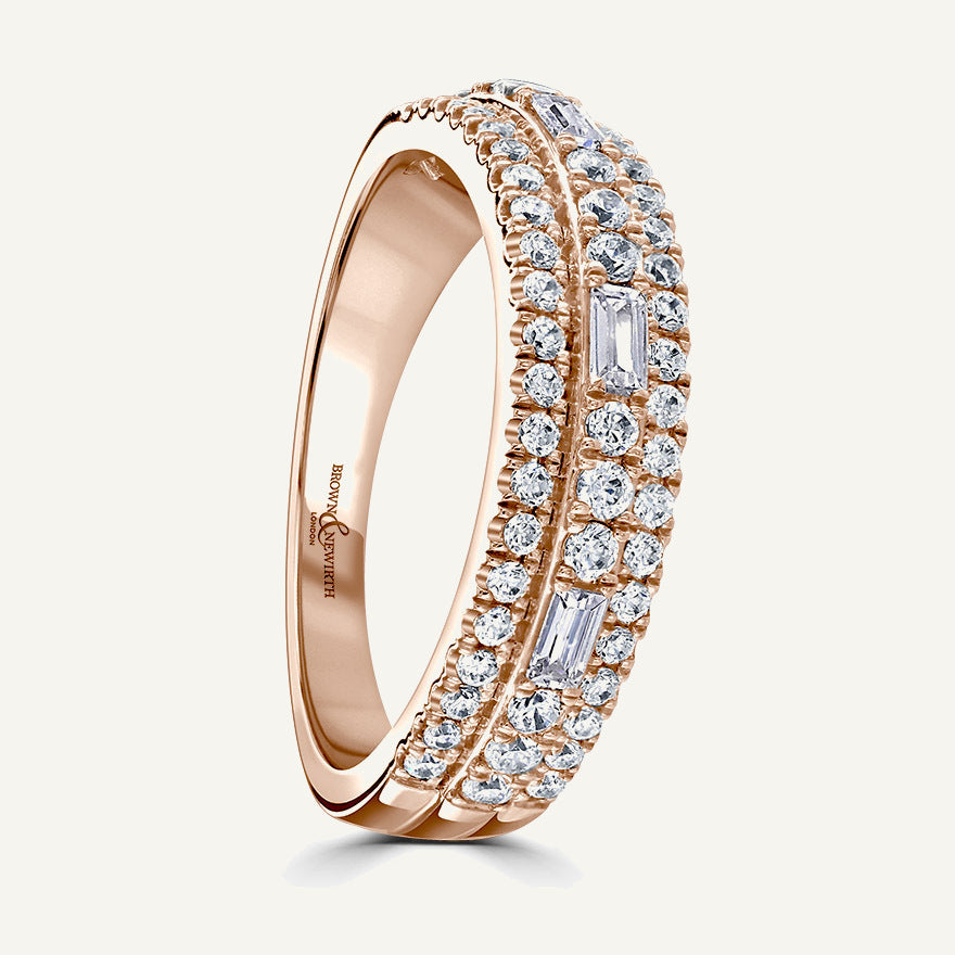 Elevated Round And Baguette Centre, Round Edge Three Row Split Claw Diamond Eternity Ring