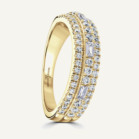 Elevated Round And Baguette Centre, Round Edge Three Row Split Claw Diamond Eternity Ring