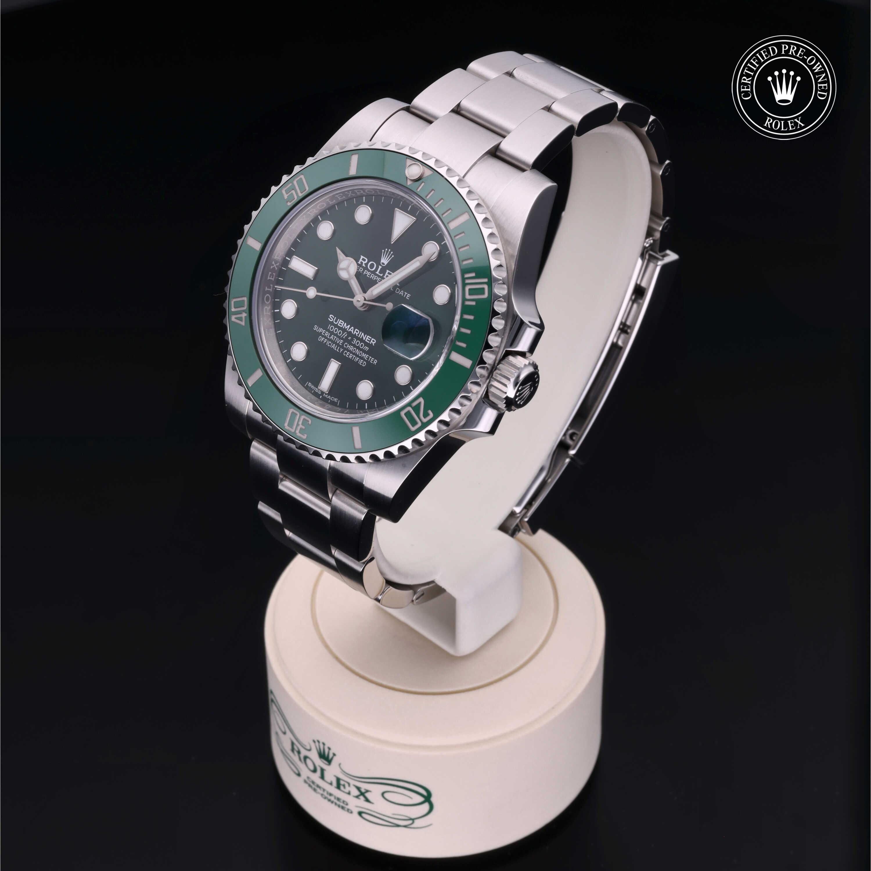 Rolex Submariner Date green dial with luminous hour markers, date display and matching 60-minute rotatable bezel