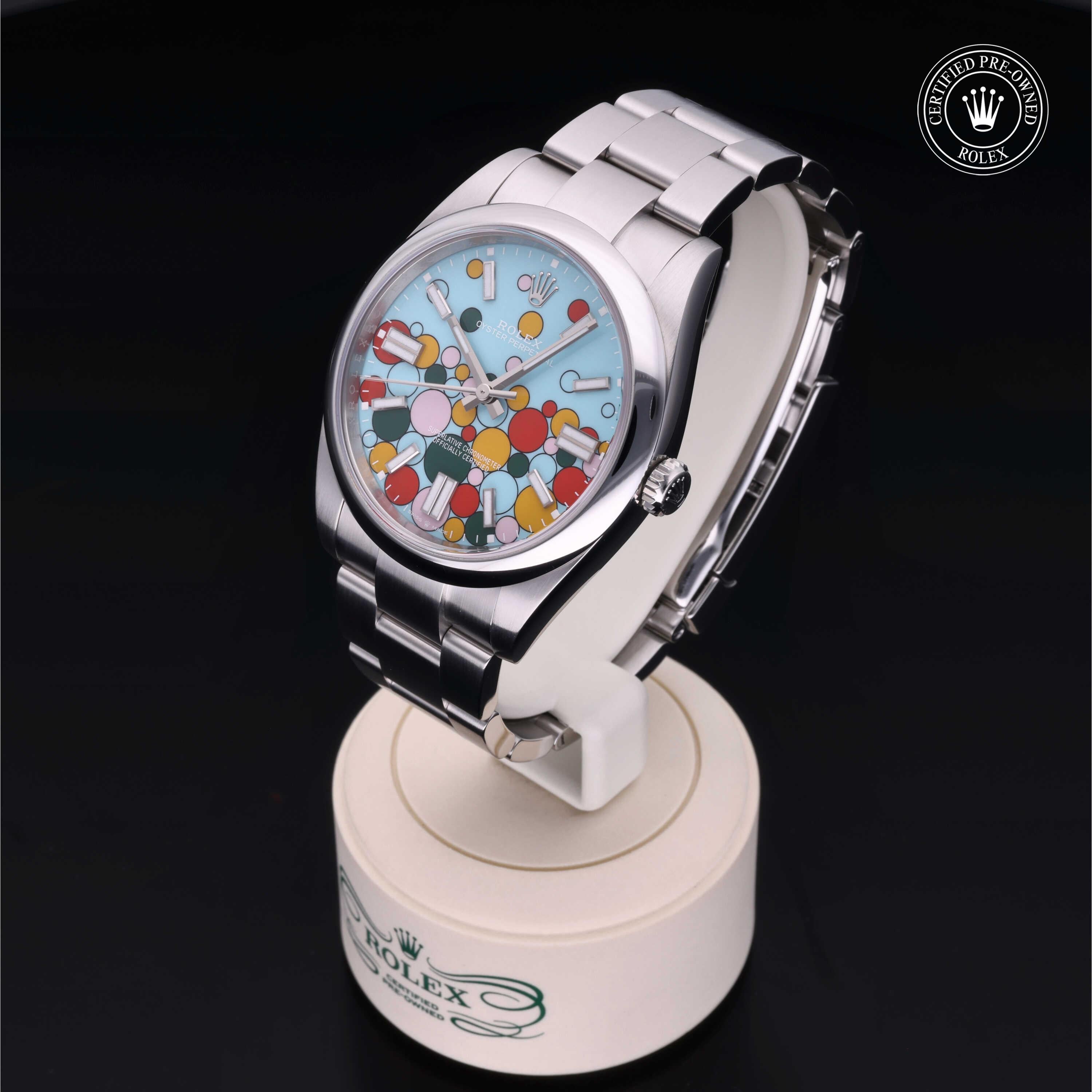 Luxury Rolex Certified Pre-Owned Oyster Perpetual 41 men's watch with a striking turquoise blue bubble-pattern dial, fixed domed bezel and timeless stainless steel design.