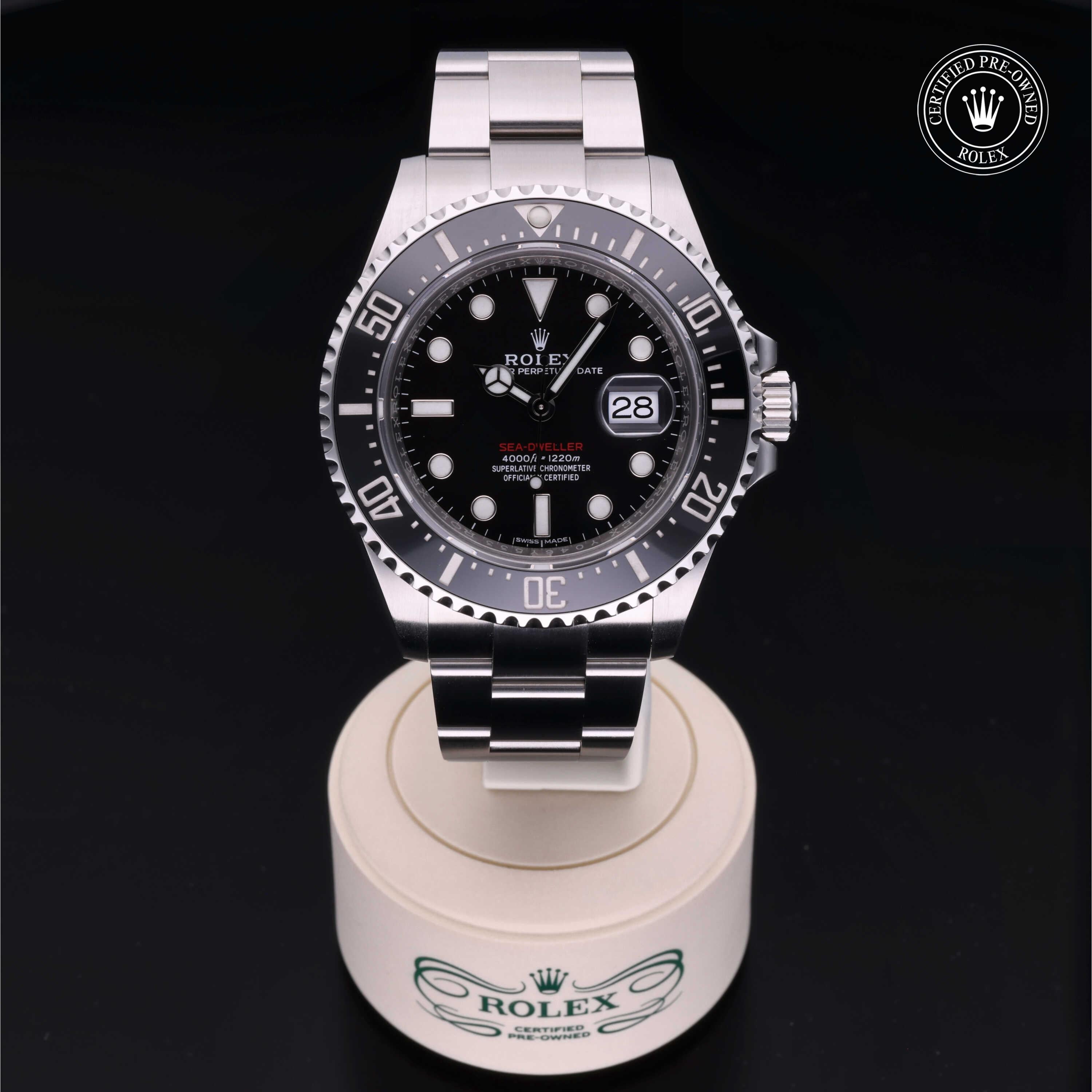 Rolex Sea-Dweller 43mm luxury diving watch with a stainless steel case, black 60-minute graduated bezel and signature three-link Oyster bracelet.