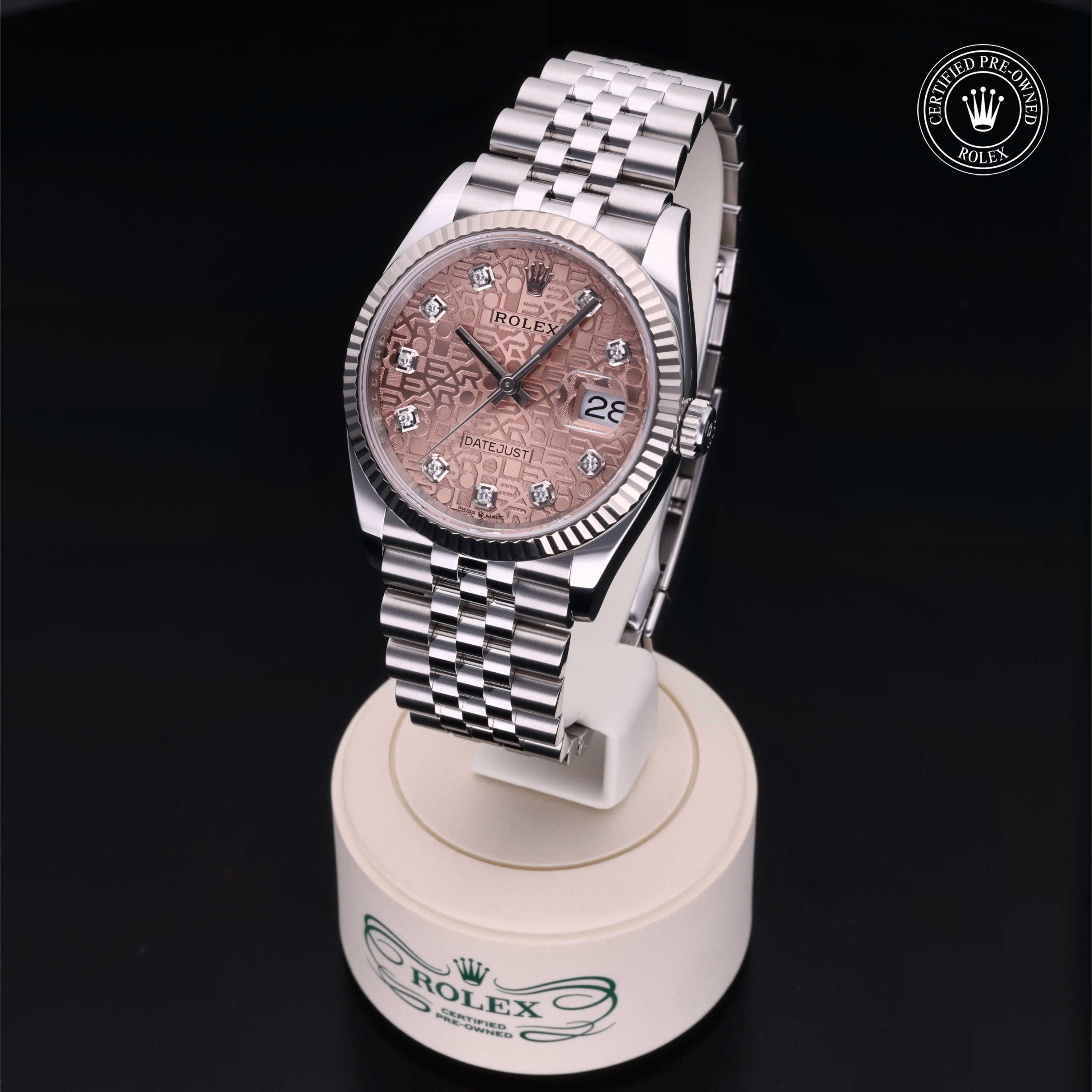 Rolex Datejust 36mm 2019 model featuring a distinctive rose Jubilee-pattern dial, 10 sparkling diamond hour markers and Oystersteel construction.