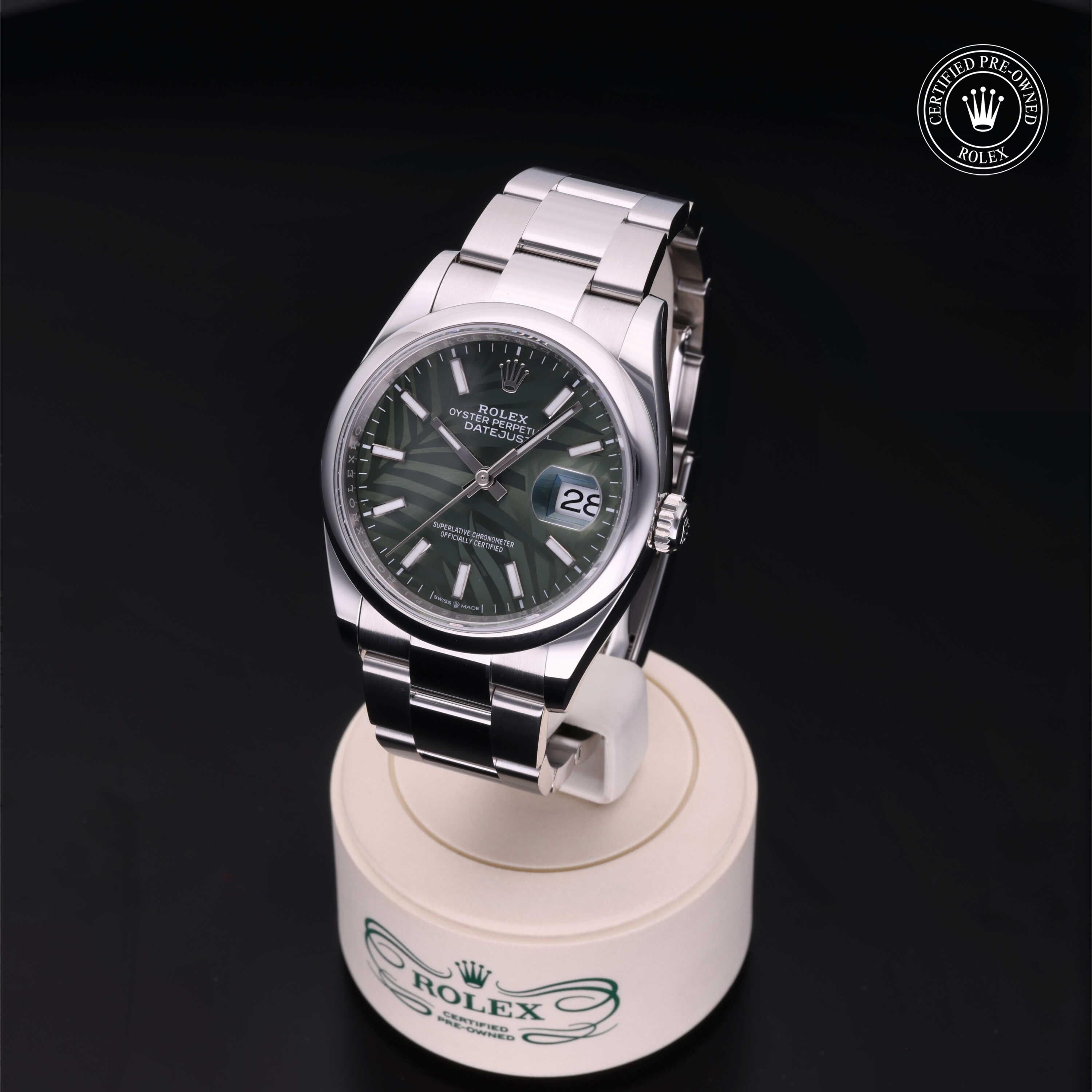 Rolex Datejust 36mm 2023 model featuring a distinctive olive green dial, smooth domed bezel and timeless Oystersteel construction.