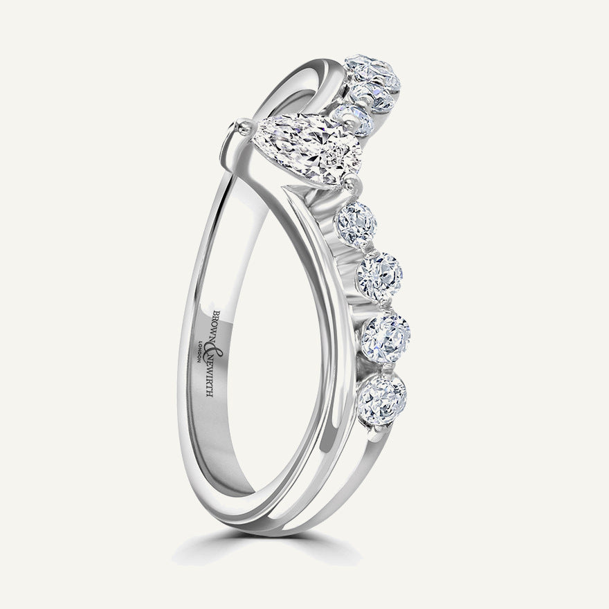 Round Brilliant & Pear Cut, Claw, Edged Diamond Eternity Ring