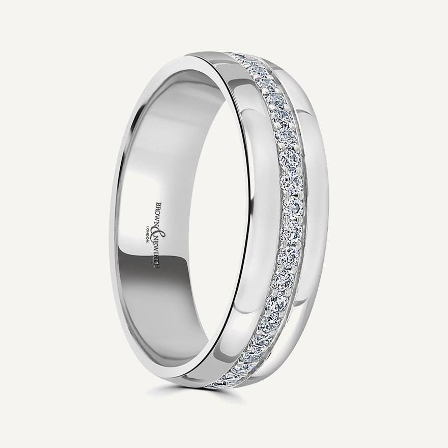 Modern Court With Pave Round Brilliant Centre Diamond Eternity Ring